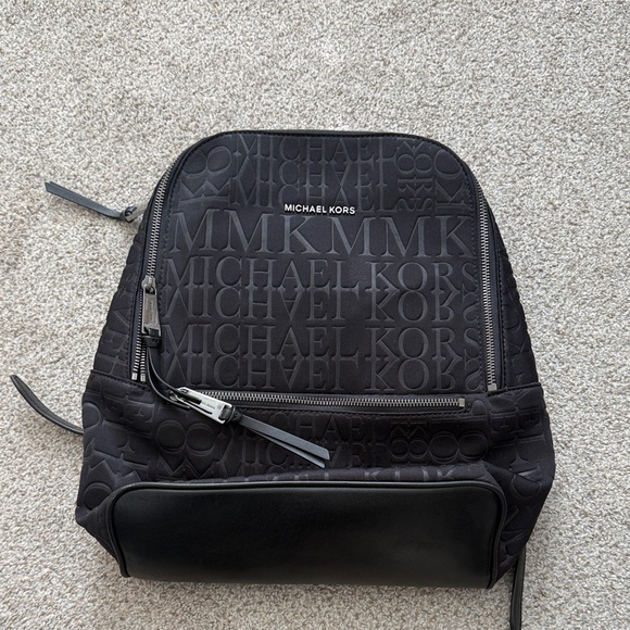 Michael Kors Embossed Black Backpack - Picture 1 of 7
